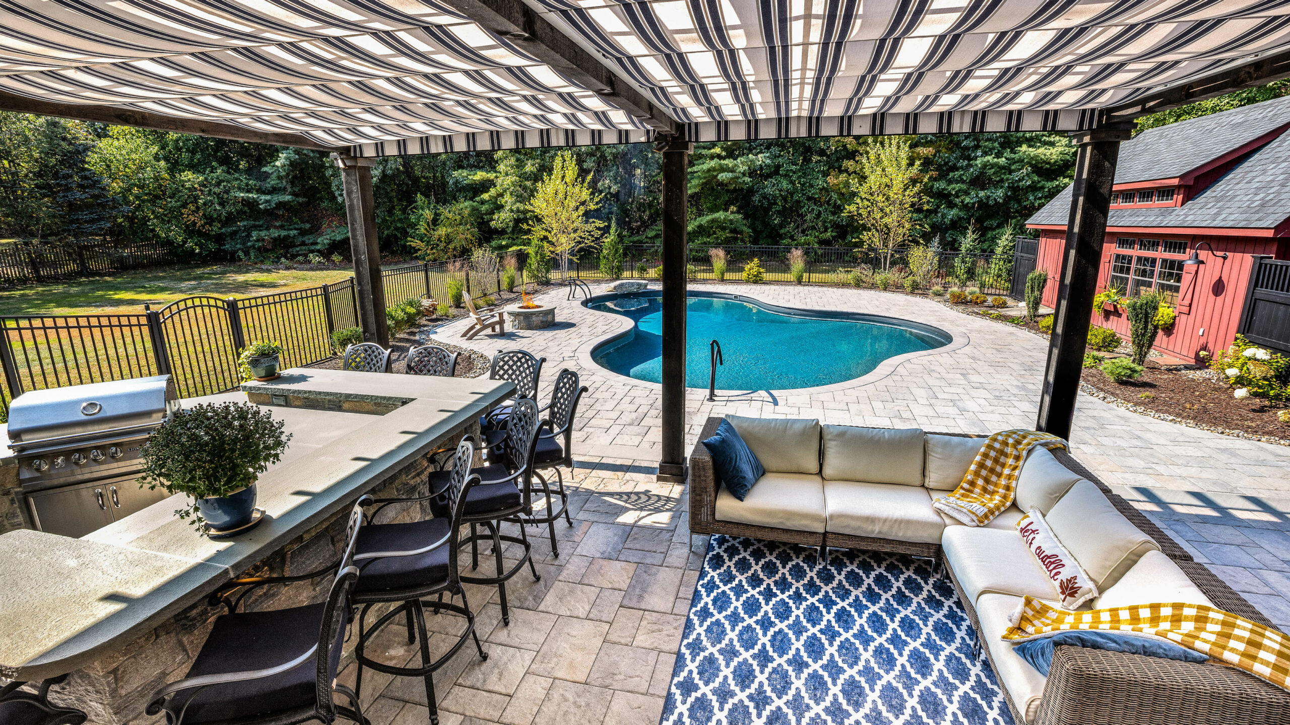 View of the pool from under a cabana.