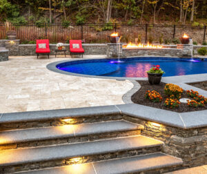 Close up of the lighted stairs leading to the pool area.