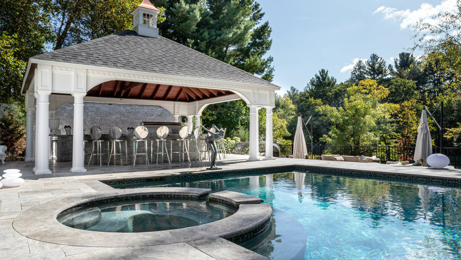 Pool, hot tub, and cabana area.