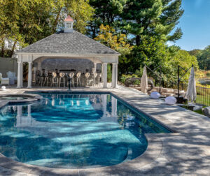 Gibson pool area with a hot tub and cabana.