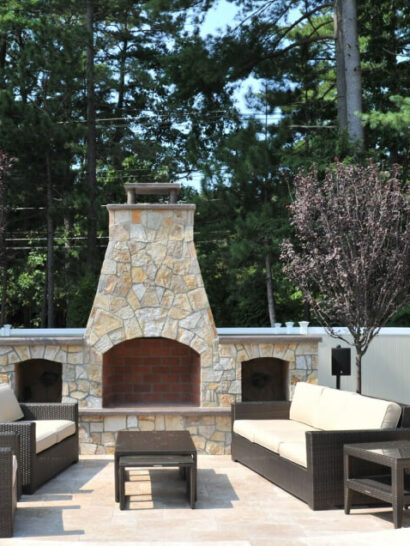 Outdoor fireplace and couches.