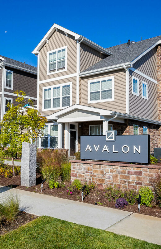 Avalon Apartments sign with landscaping. Dex by Terra Commercial Landscape Design-Build project.