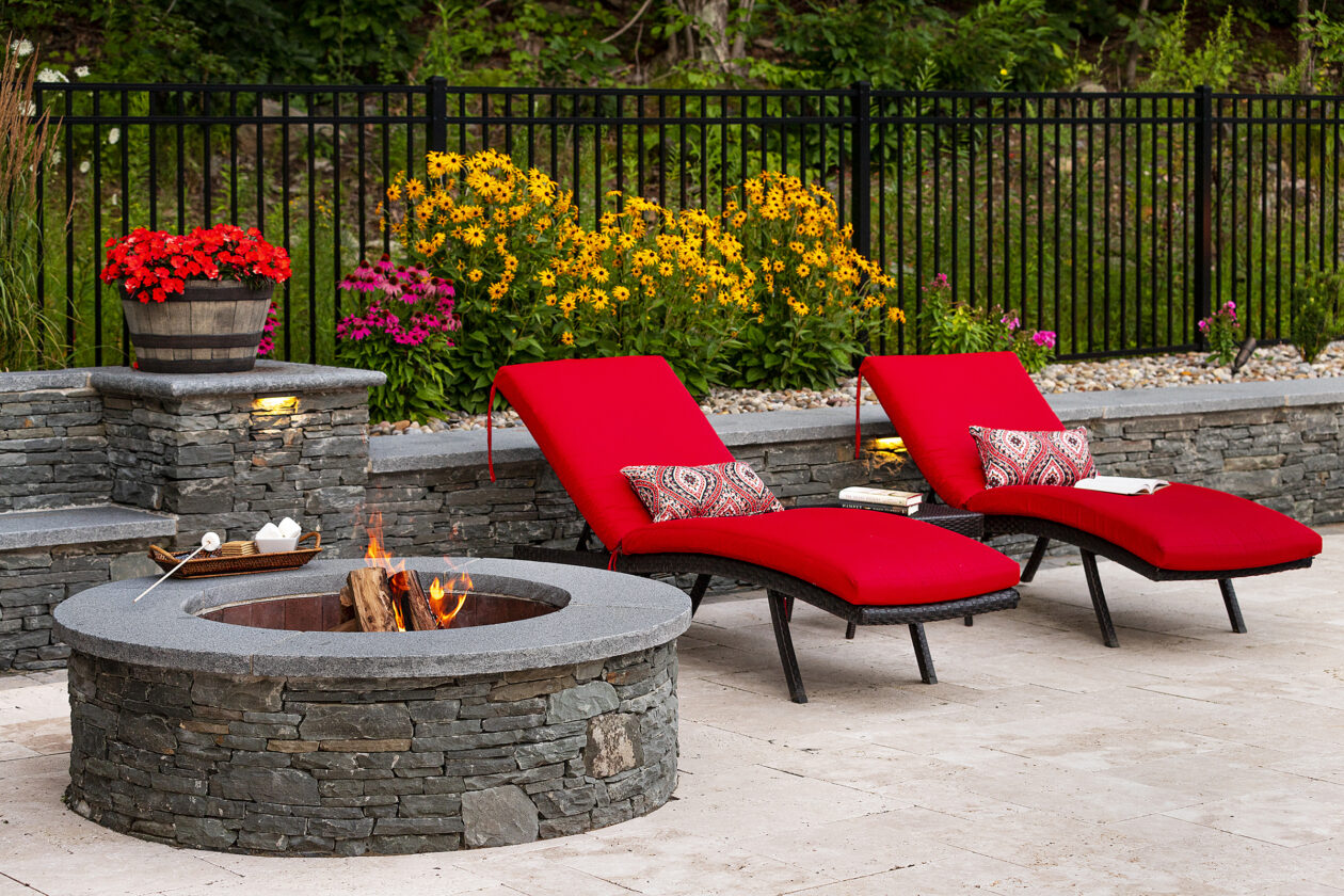 Pool chairs next to fire pit