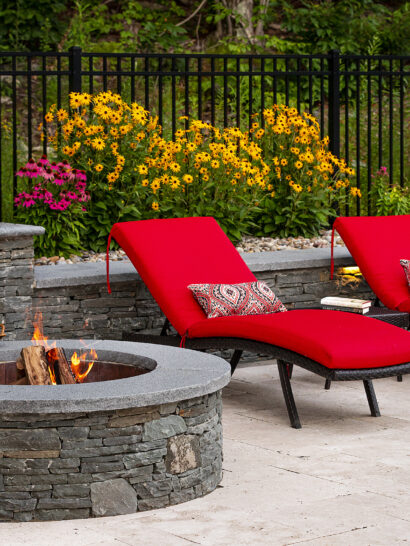 Pool chairs next to fire pit