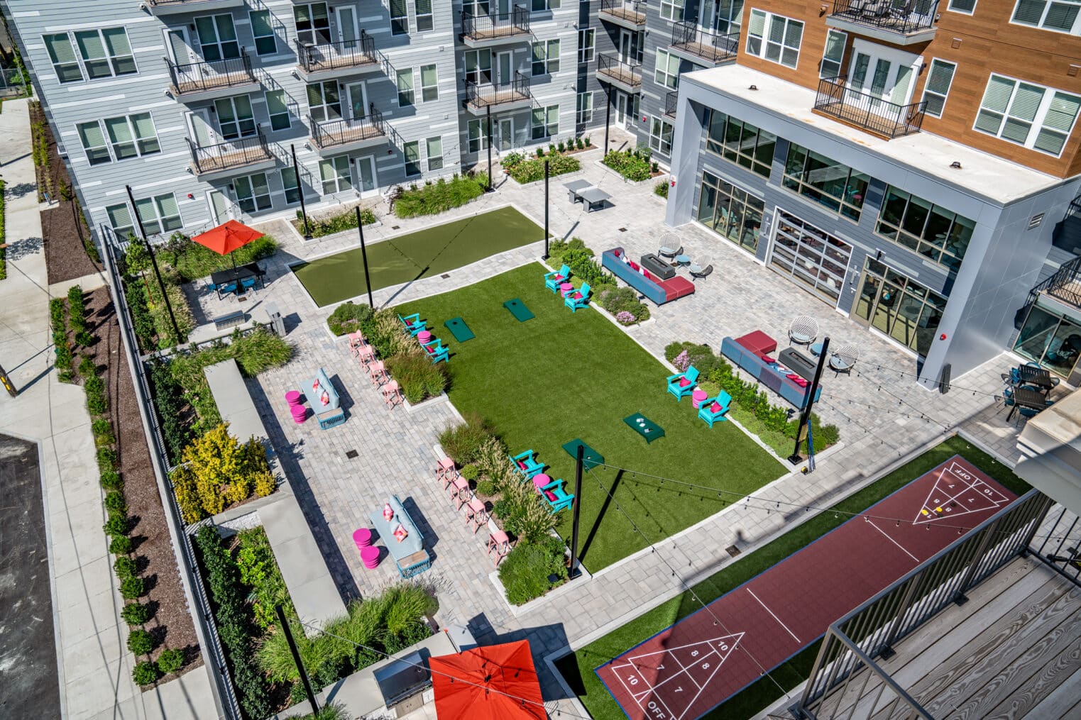 The 3rd floor central courtyard, built by Dex by Terra, at V2 Apartments in Chelsea, Massachusetts.
