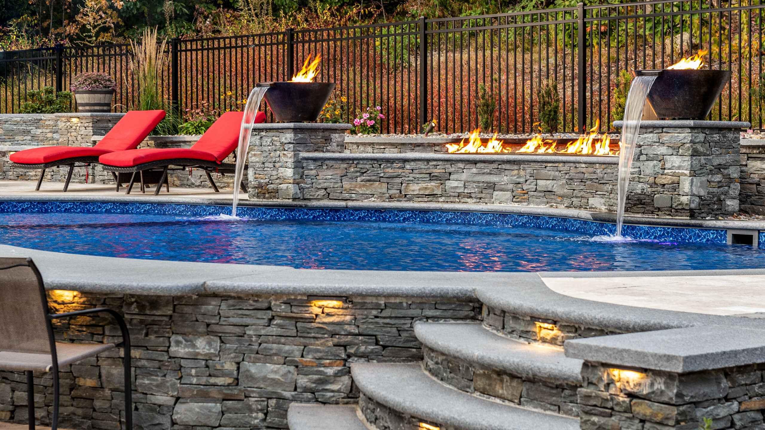 Close up of the pool fountains with fire.