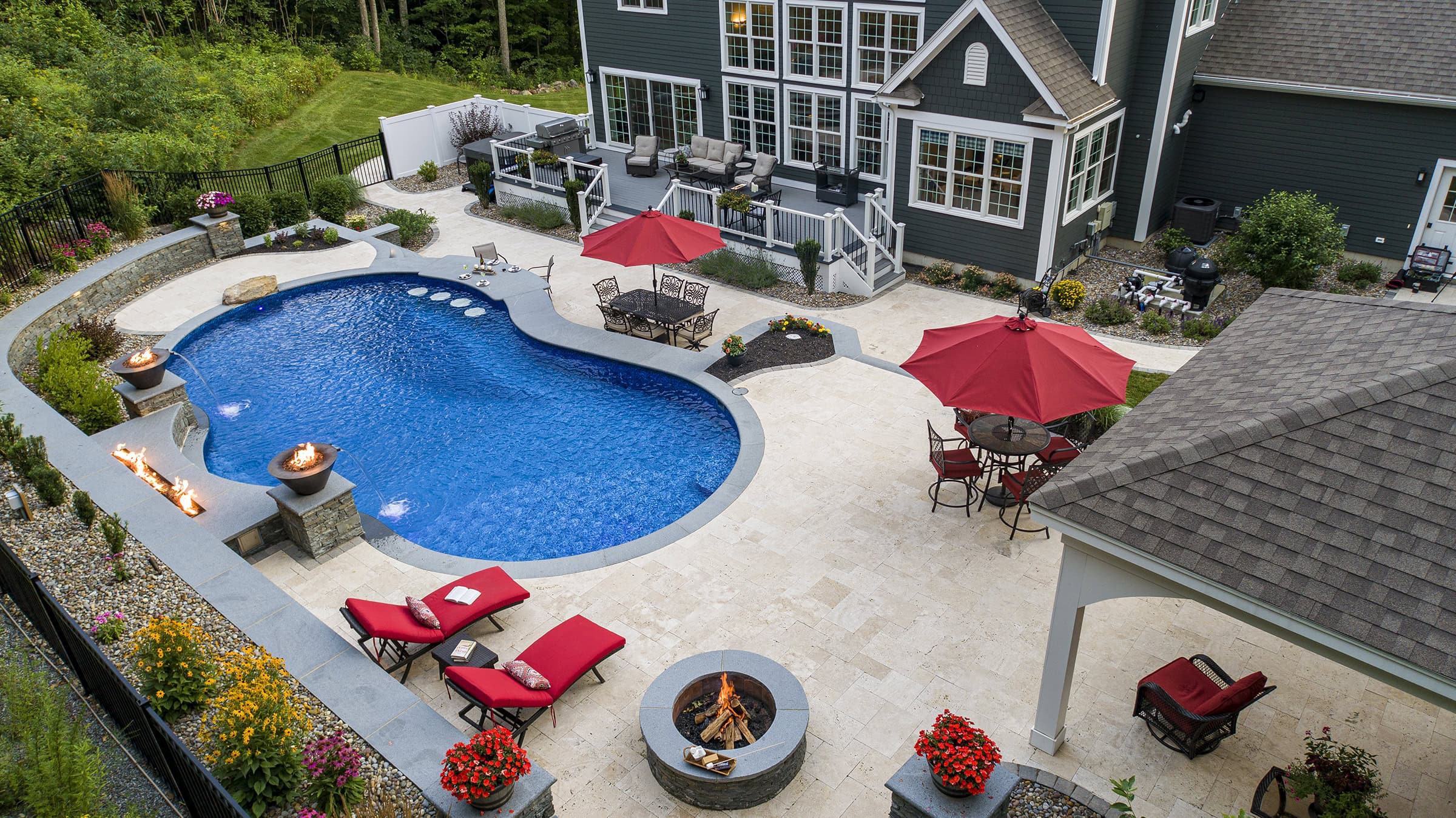 Sterling MA pool drone looking toward back of house