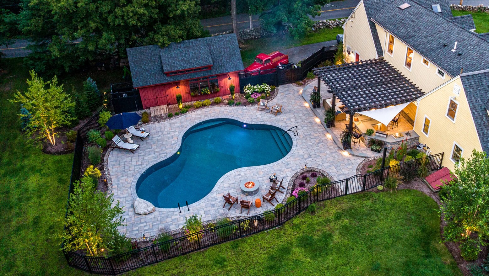 Landscaping Design Process. Drone Image of finished pool design project in Stow MA.
