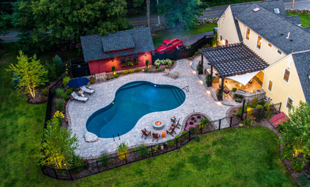 Drone Image of finished pool design project in Stow MA. Dex by Terra Landscaping Design Process.