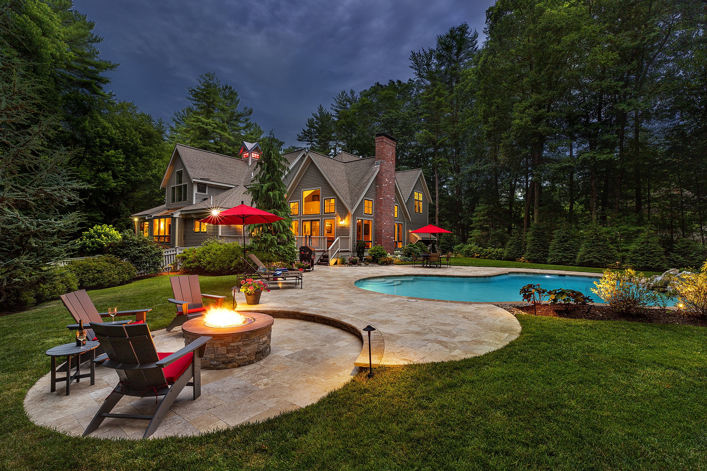 Sunken gas fire pit by the backyard pool. Dex by Terra pool renovation project in Carlisle, Massachusetts.