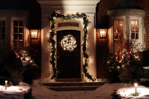 A home with a nice display of Christmas lights and decorations.