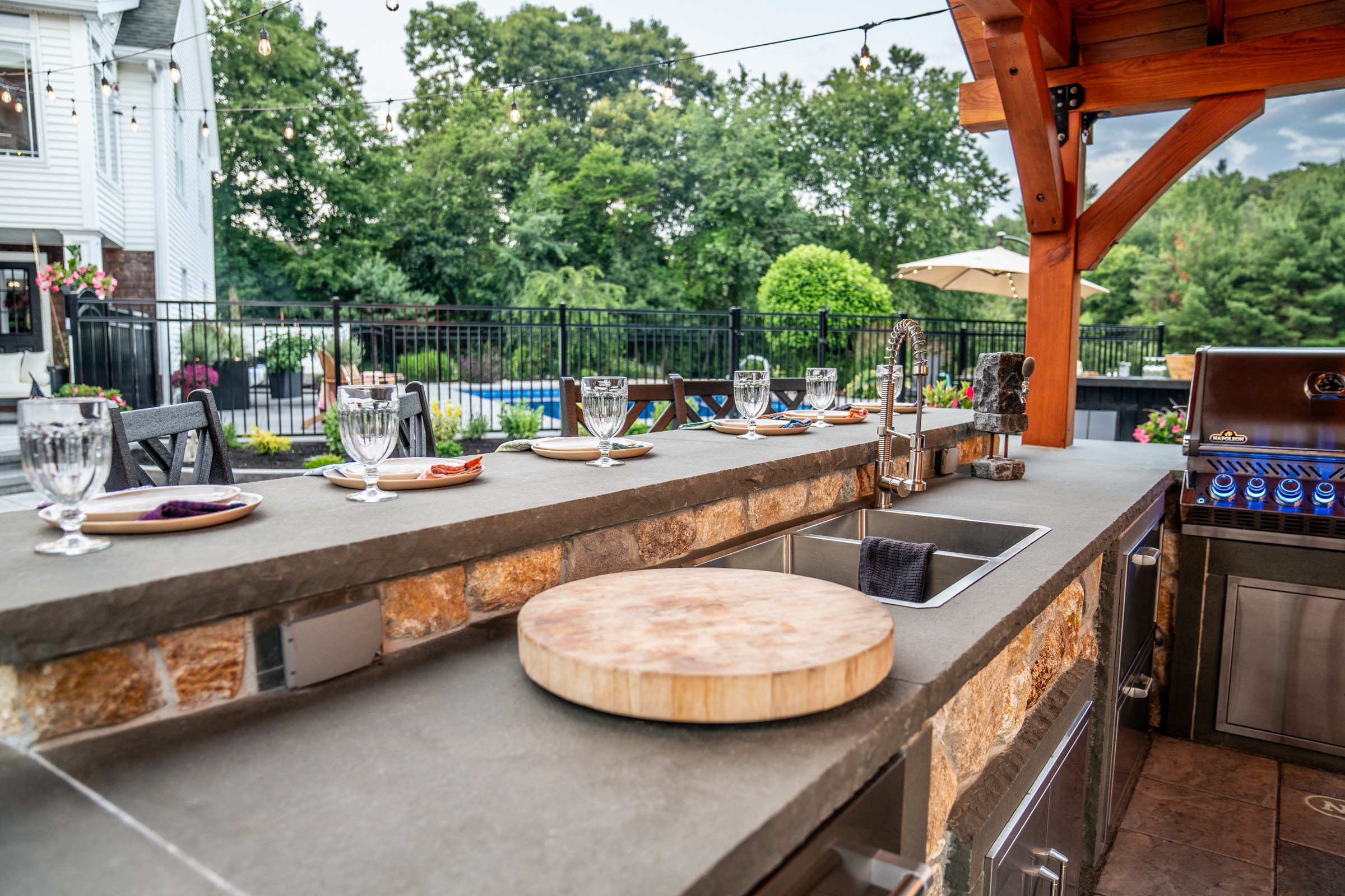 Venetian bluestone countertops were used for the food preparation space in this outdoor kitchen.