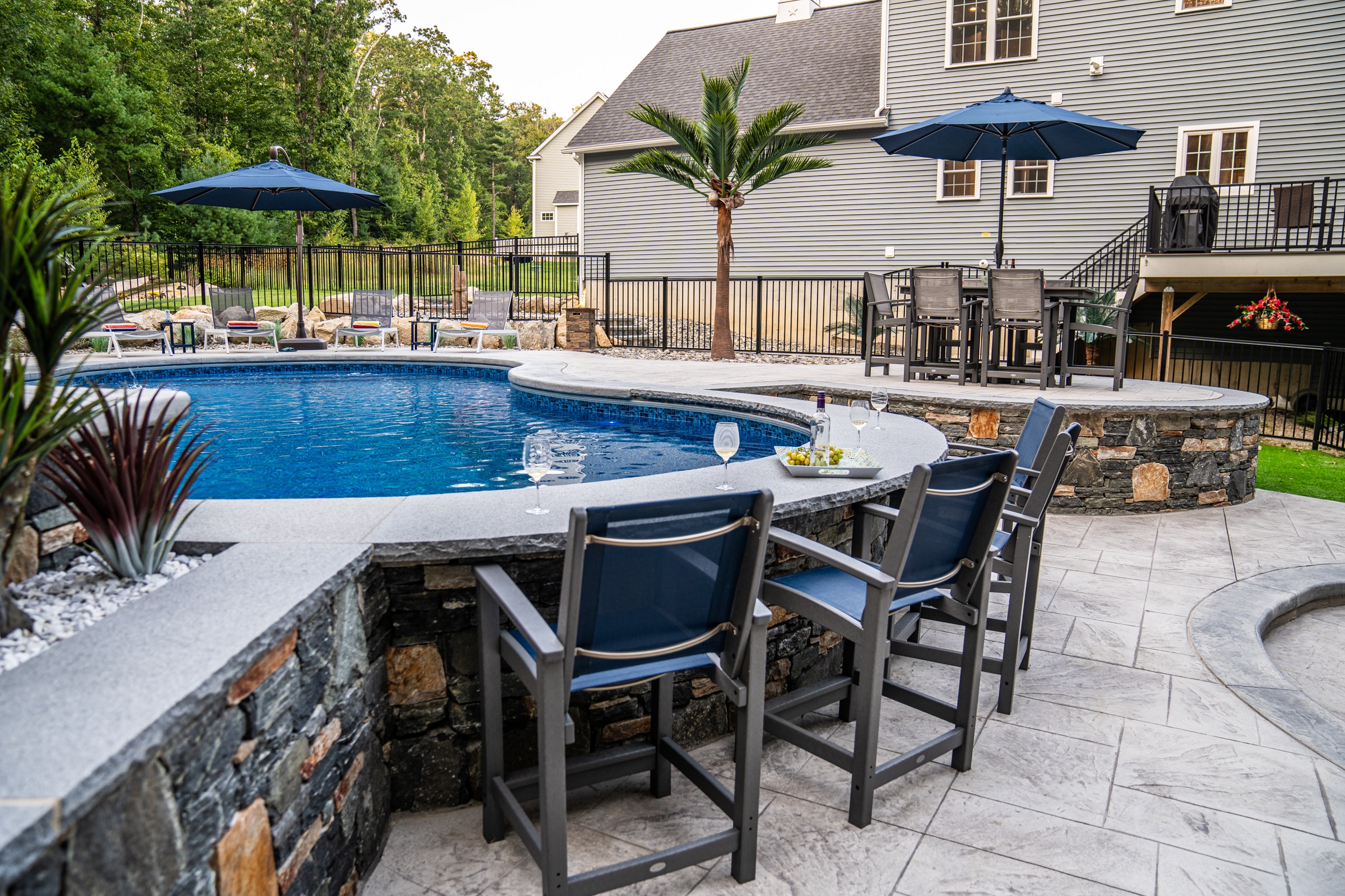 Our clients in Northbridge, Massachusetts can enjoy drinks and food by the pool with this poolside bar built by Dex by Terra.