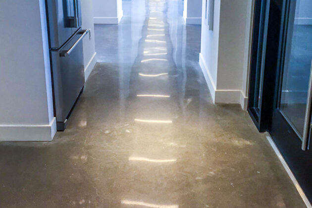 A Polished Concrete Floor at luxury condo in Massachusetts. Commercial concrete floor polishing by Dex by Terra.