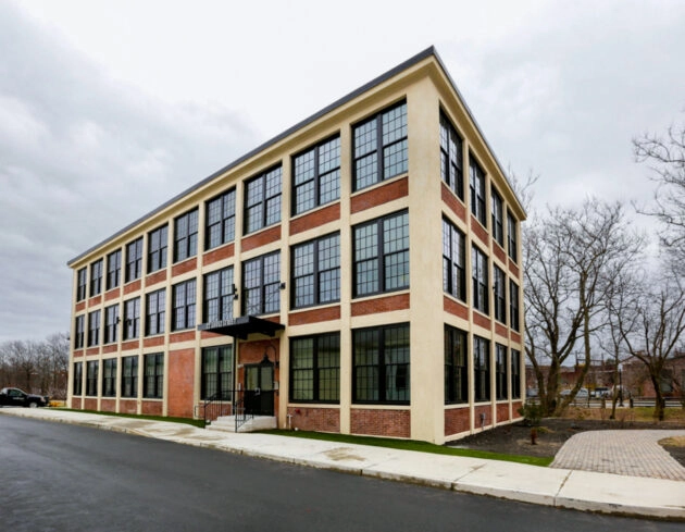 Office building with brick exterior after restoration & repointing. Dex by Terra Commercial Masonry project in MA.