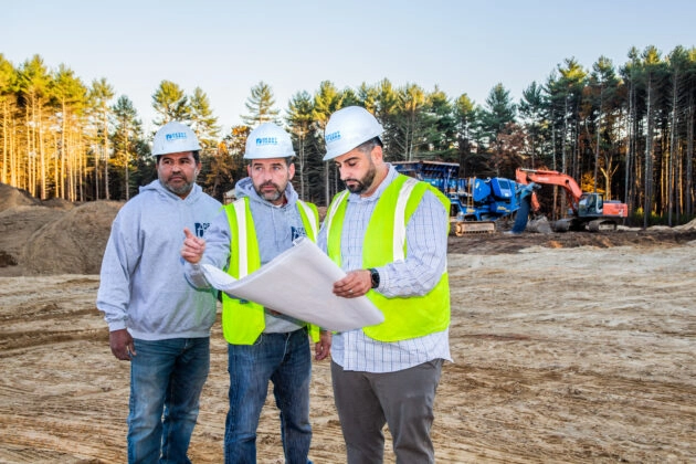 Contractors Looking at Plans